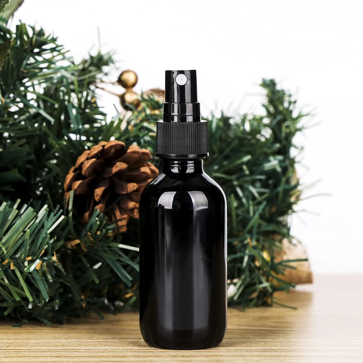 2oz Glass Spray Bottle, Fine Mist Boston Glass Bottles with Black Fine Mist Sprayer Small Clear Bottles for Essential Oils, Bath, Beauty, Hair & Cleaning, UV Black, Pack of 12